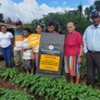 image of the Juan Lucas Gonzalez family and a bag of their coffee