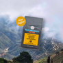 Mexico Dancing Goats Coffee package with a mountainous landscape in the background