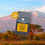 image of Tanzania coffee bag over image of Tanzania landscape