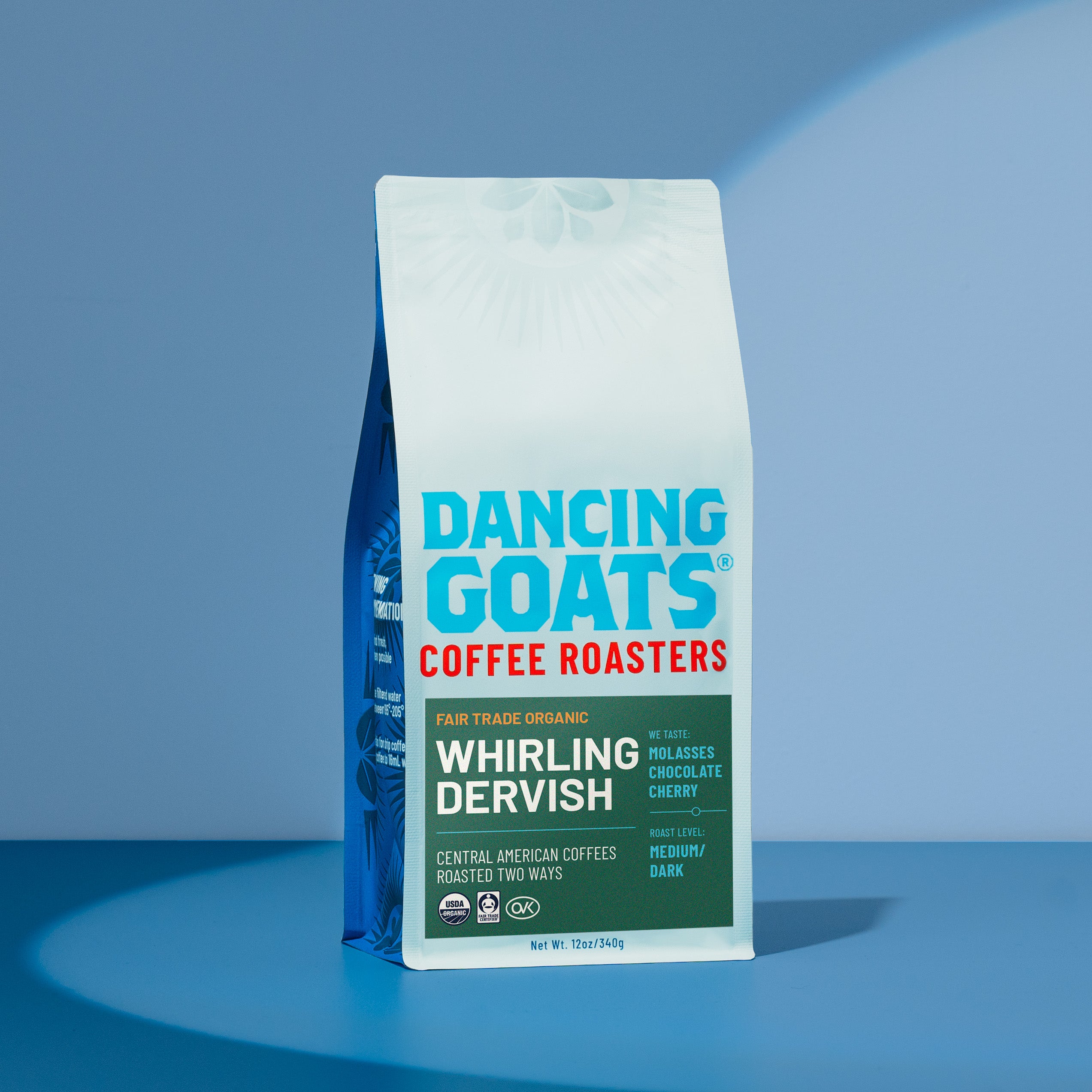 Dancing Goats Coffee Roasters bag on a blue background