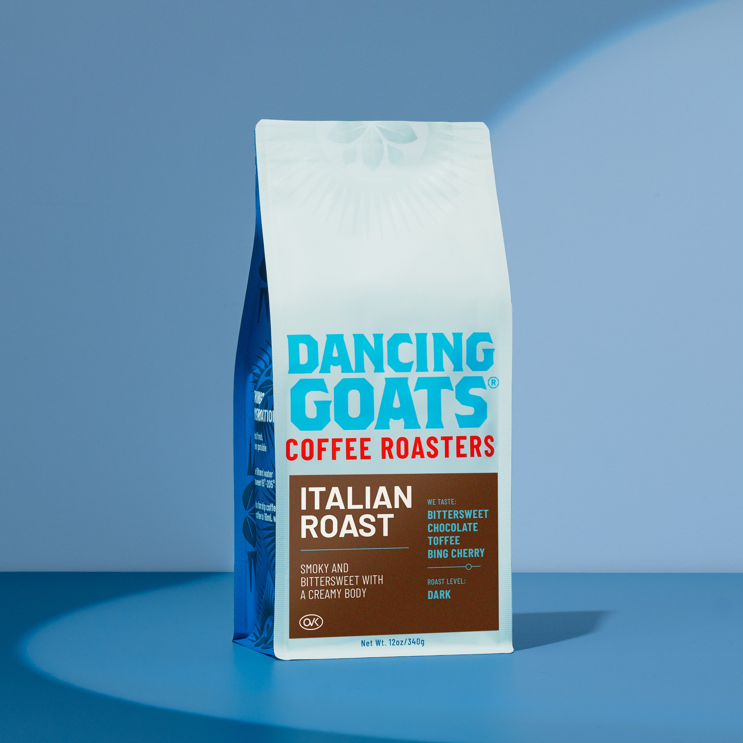Dancing Goats Coffee Roasters Italian Roast coffee bag on a blue background