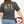 woman wearing game day shirt and holding soccer ball