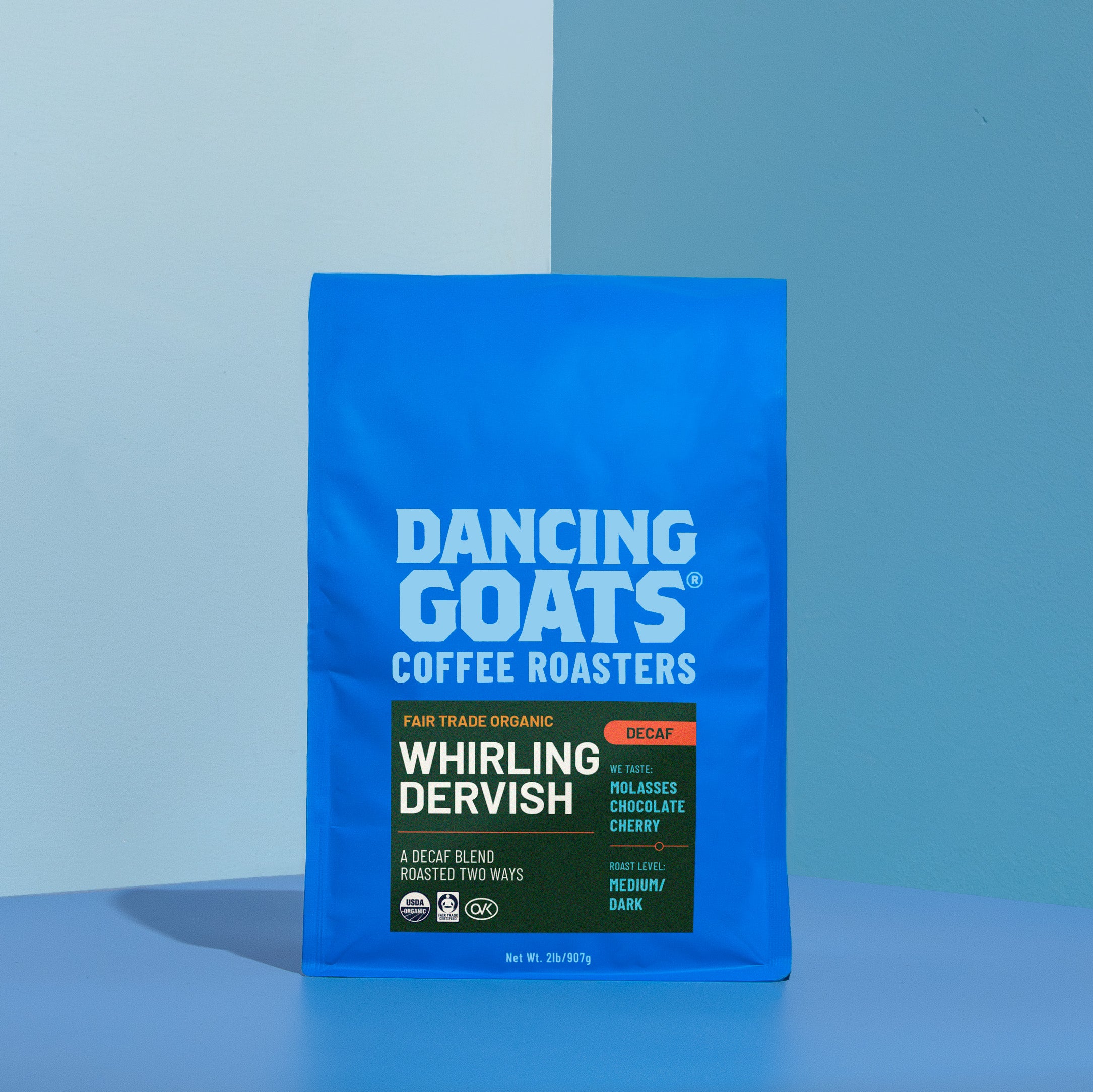 Blue bag of Dancing Goats Coffee Roasters on a blue background