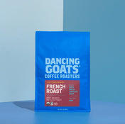 Blue bag of Dancing Goats Coffee Roasters French Roast coffee on a blue background