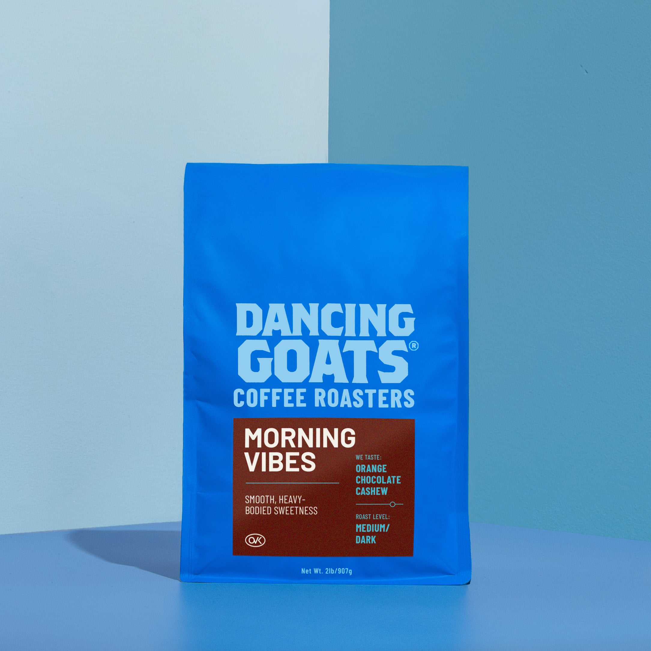Dancing Goats Coffee Roasters 'Morning Vibes' coffee bag on a blue background
