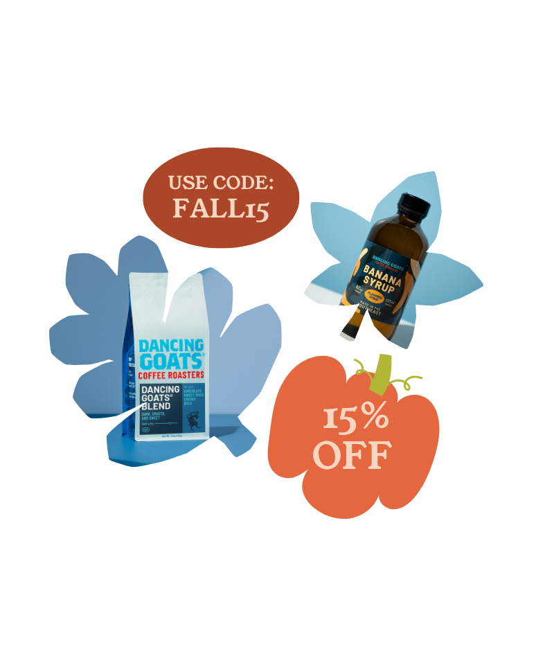 Promotional graphic showing a bag of Dancing Goats Coffee Roast alongside a bottle of Banana Syrup, with sale text overlays reading 'USE CODE: FALL15' and '15% OFF' on a white background.