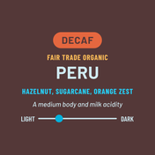 Decaf Fair Trade Organic Peru coffee label with flavor notes and body description on a brown background.