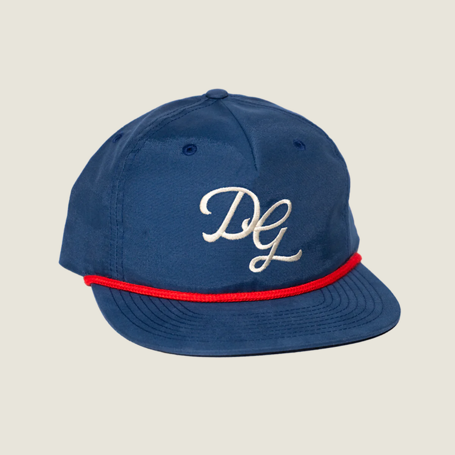 Dancing Goats navy snap back hat with red cord