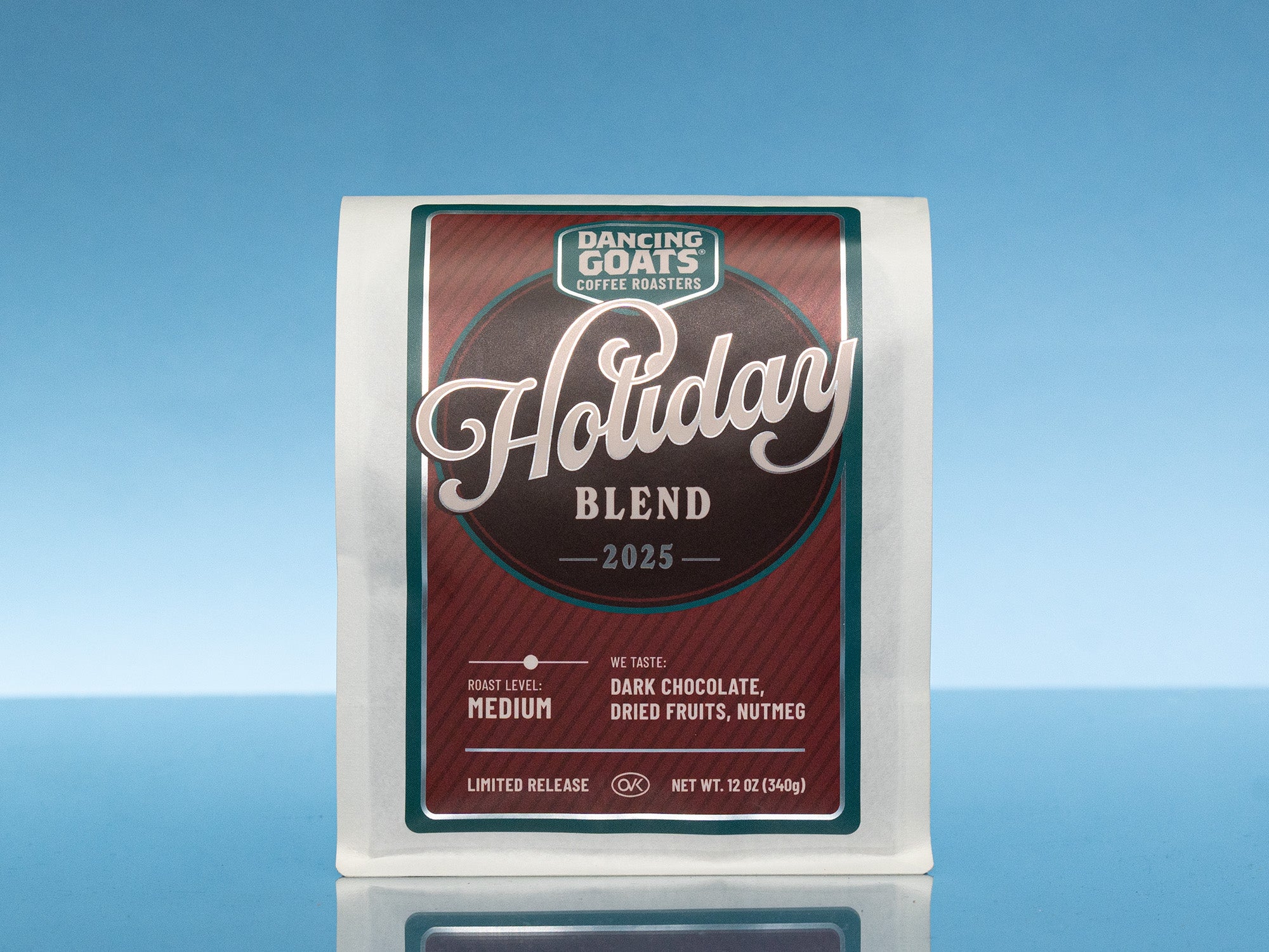Dancing Goats Coffee Roasters Holiday Blend 2025 coffee package on a blue background