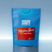 Blue coffee bag with 'Dancing Goats Coffee Roasters' and 'Mexico Sicoli' label on a light blue background