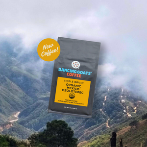 Mexico Dancing Goats Coffee package with a mountainous landscape in the background